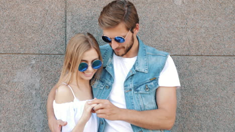 couple posing outdoors