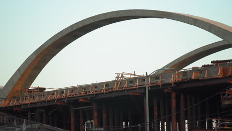 aerial shot of the 6th st bridge in downtown los angeles as sun is beginning to set 6th street bridge