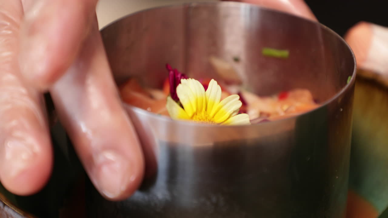 Food Plating - Chef Lifts The Stainless Moulder Before Serving The Tuna Ceviche With A Beautiful Daisy Flower As Garnish