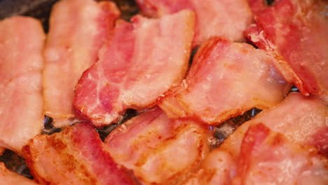 Frying-bacon-in-a-pan.-Cooking-meat