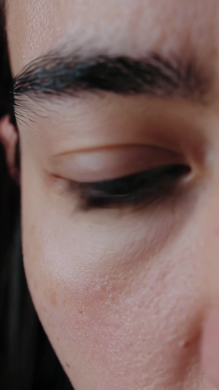 Close-up of a woman's eye and eyebrow