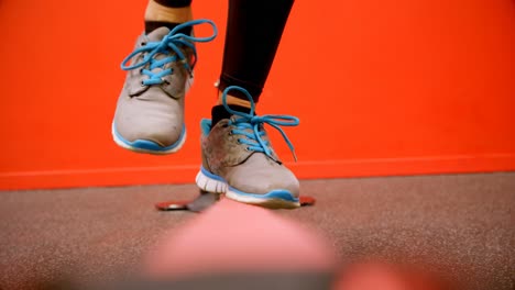 woman doing balancing exercise in fitness studio 4k