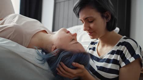 video of affectionate lesbian kissing her girlfriend in the forehead