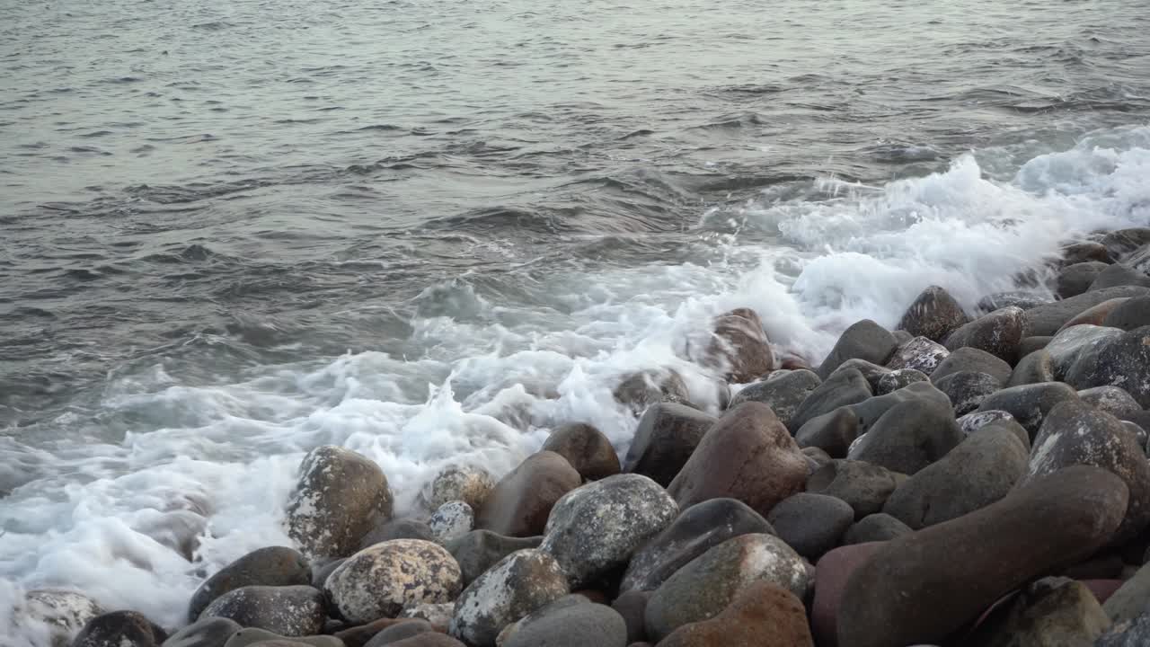 Sea Waves Splashing On Pebble Rocks At Beach On Philippine Coast. static shot