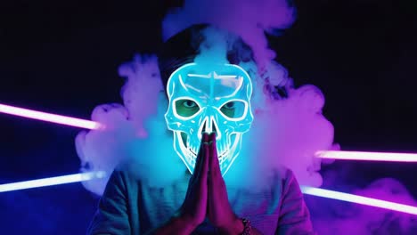 Person in Glowing Skull Mask with Neon Lights and Smoke