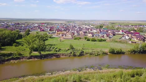 aerial view of a suburban development near a river