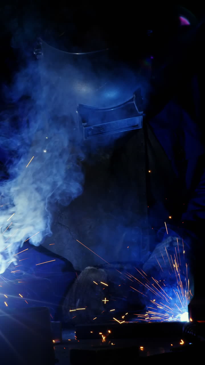 Welder welding a metal
