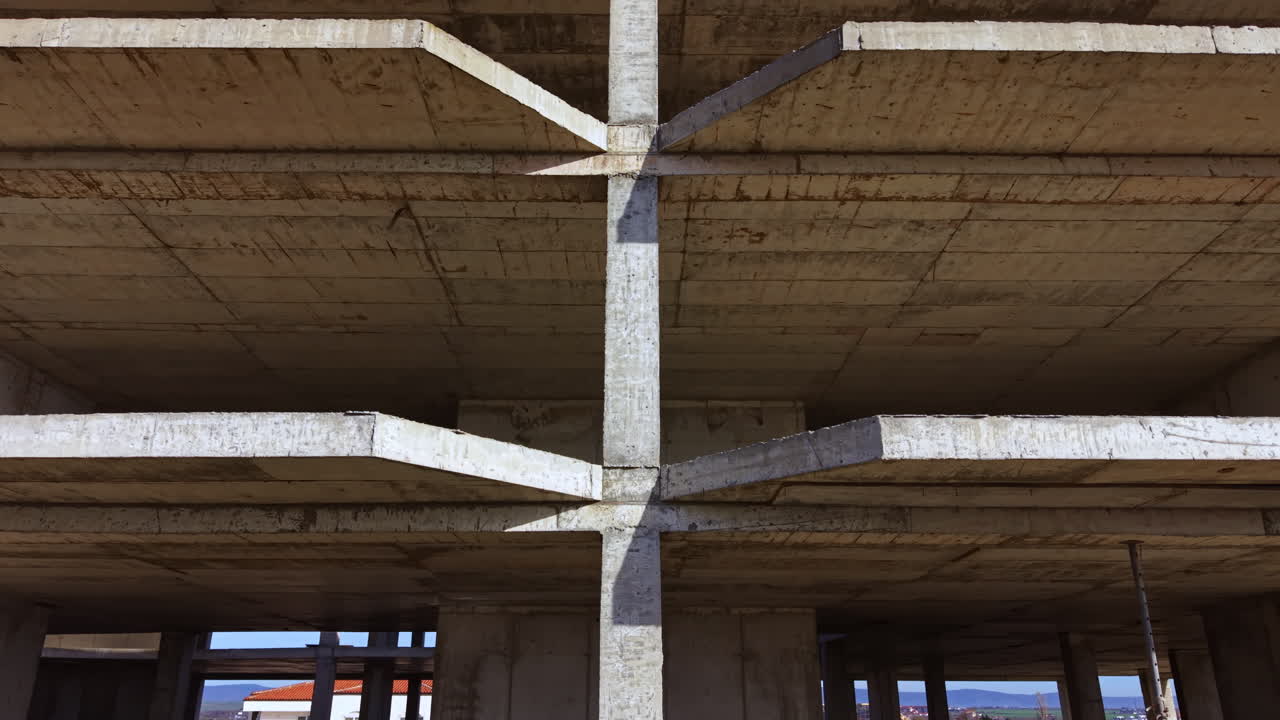 Exploring the geometric beauty of a deserted construction site in soft afternoon light