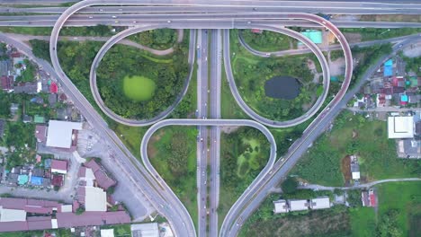 4k time lapse or hyper lapse : aerial view network or intersection of highway road for transportation or distribution concept background.