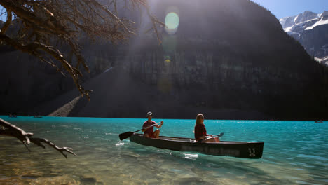 Couple-rowing-boat-in-river-at-countryside-4k