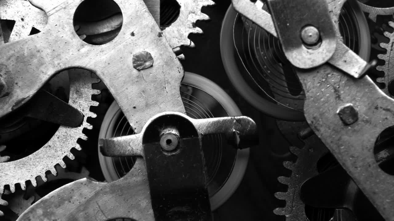Watch mechanism macro loop. Old vintage clock mechanism working, closeup shot with soft focus. Close up of a internal clock mechanism. Vintage Watch Gears Movement Macro.