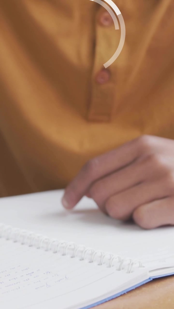 Vertical video: Teen reading notes for study, sound causing look, AR numbers peaking then dropping