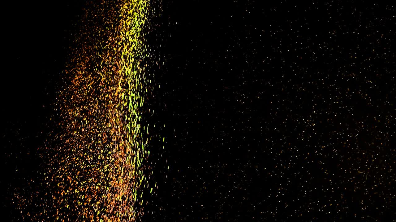 la corriente de partículas doradas relucientes en cámara lenta