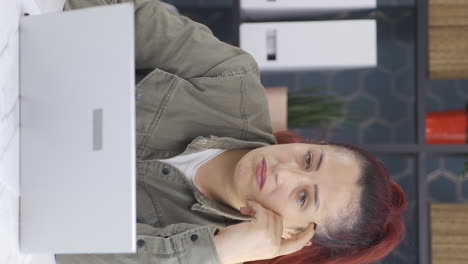 Vertical-video-of-Business-woman-looking-at-camera-with-wonder-and-bewilderment.