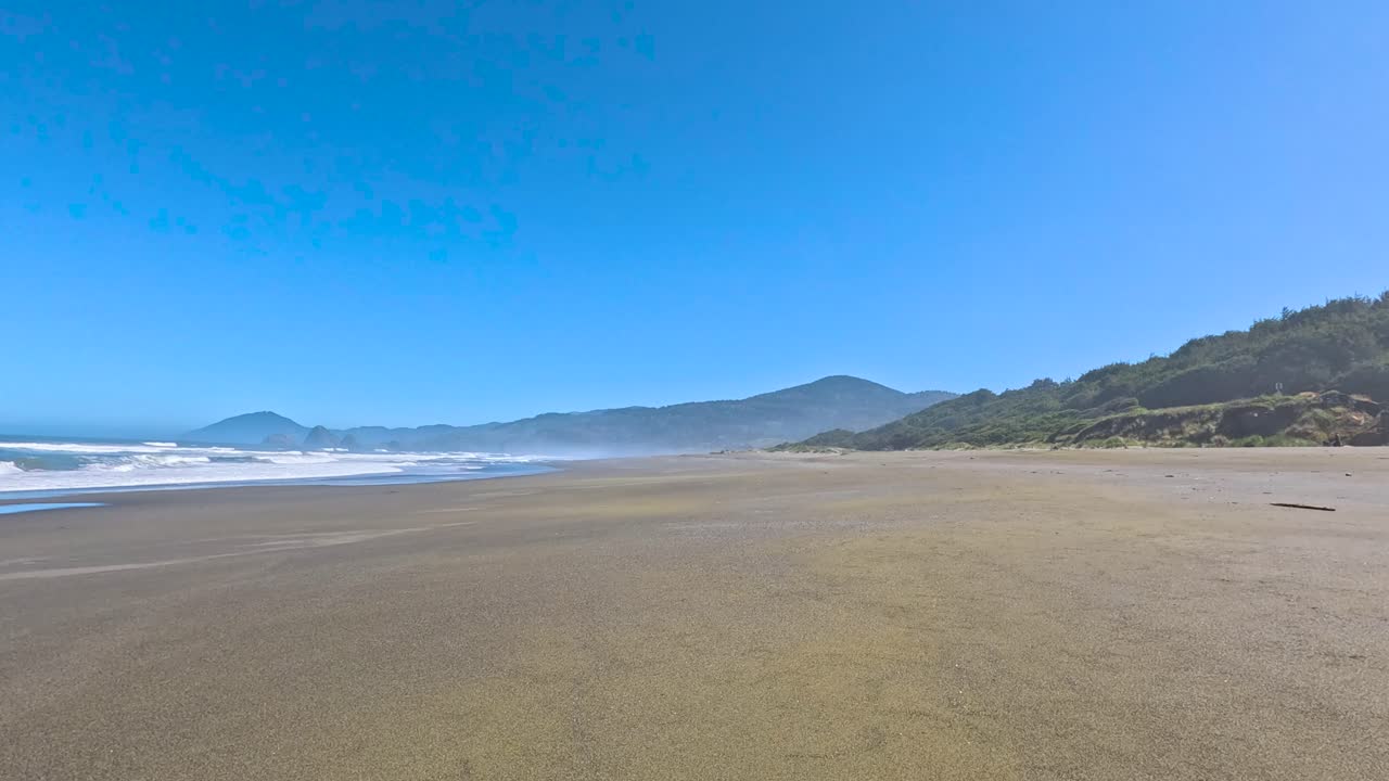 Pacific Ocean current rides onto California beach