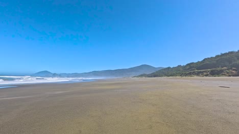 pacific ocean current rides onto california beach