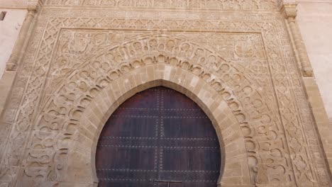 Ornate-wooden-door-of-Kasbah-Udayas-in-Rabat,-showcasing-Moroccan-architecture