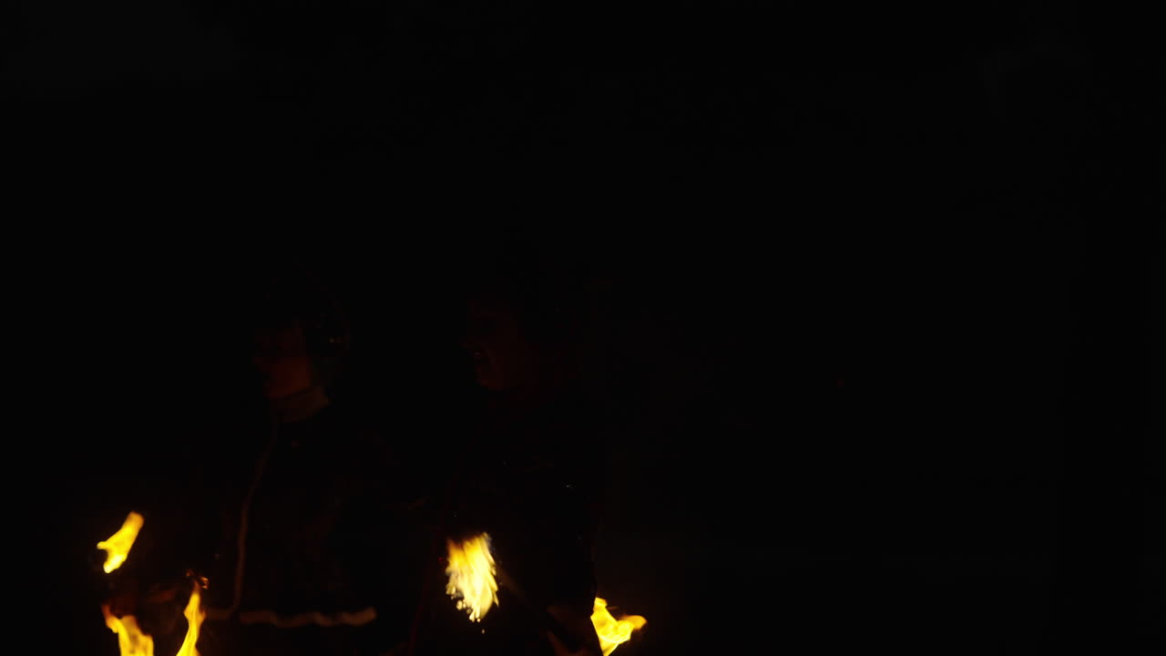 Fire Dancers at Night