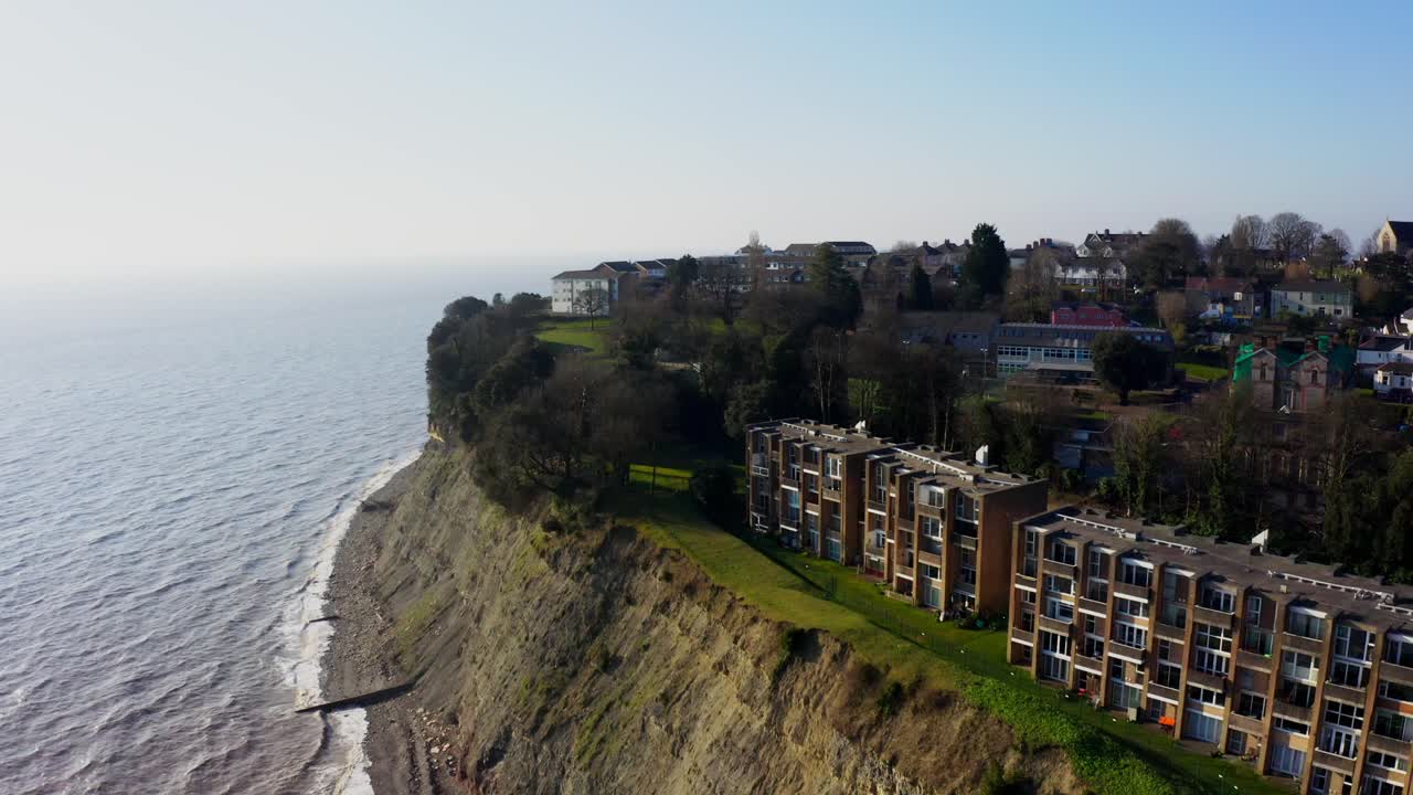 Coastal cliffs, Penarth, Wales modern homes perched above the sea, scenic aerial view