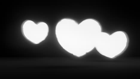 white energy heart shapes on a dark background
