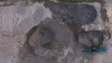 Aerial-View-of-Quarry-with-Stone-Crushing-Machine-and-Material-Piles