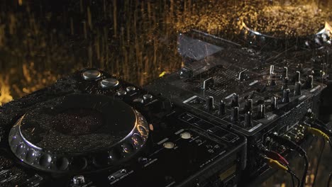dj equipment in the rain