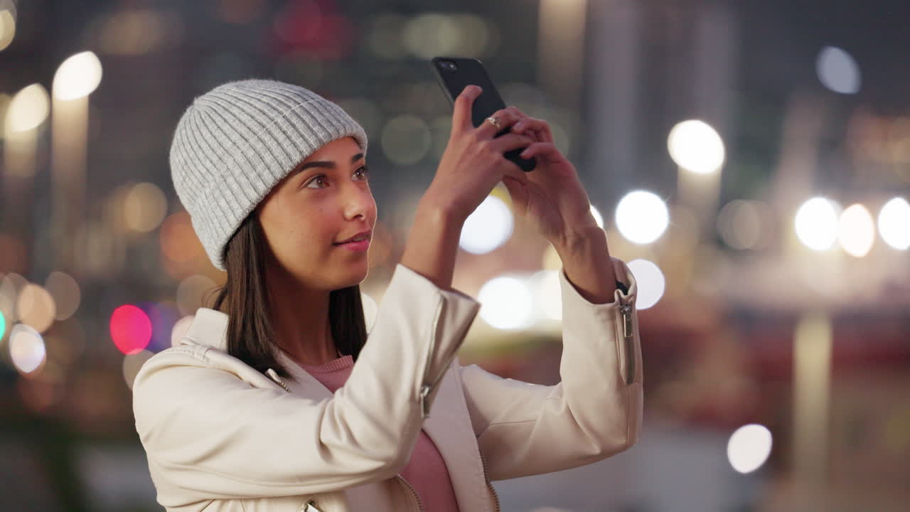 Tourist taking a selfie on a phone in a city alone