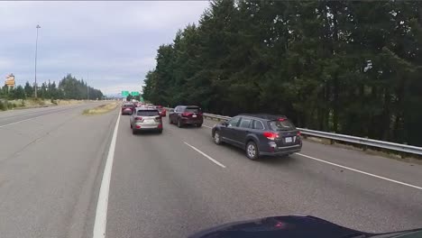 slowly driving forward in stop and go traffic.