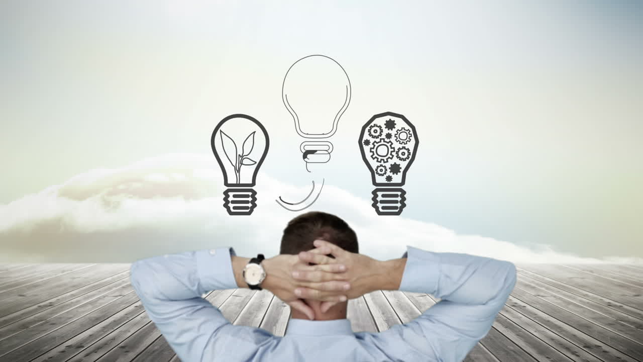 hombre de negocios observando las bombillas aparecen