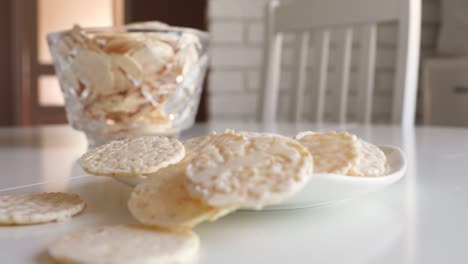 round cookies in white chocolate on a white table. sweet morning.