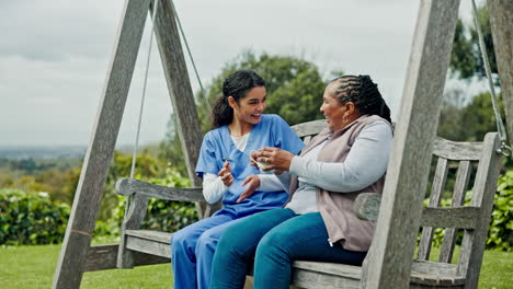 Senior-woman,-outdoor-and-nurse-with-coffee