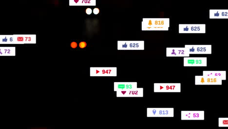 animation of social media icons and numbers over out of focus road traffic and cityscape