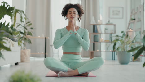 yoga, woman and home fitness of a young mixed race