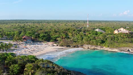 beautiful paradise bay of caribe beach. aerial circling