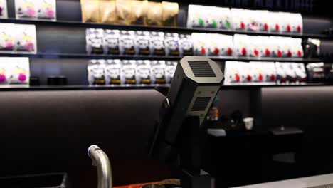 a coffee shop counter with various items