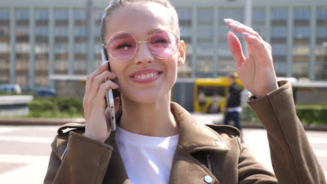 happy woman on phone call in city