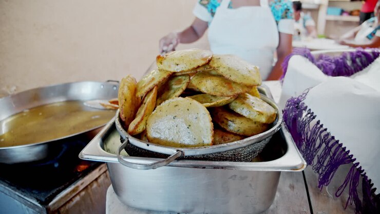 Slow motion close shot of tortillias being prepared in the back of the kitchen, Quintana Roo, Mexico