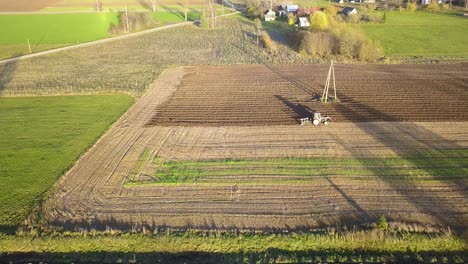 Hard-Working-Farmer-using-Tractor-to-Plow-Fields-for-Crop-season
