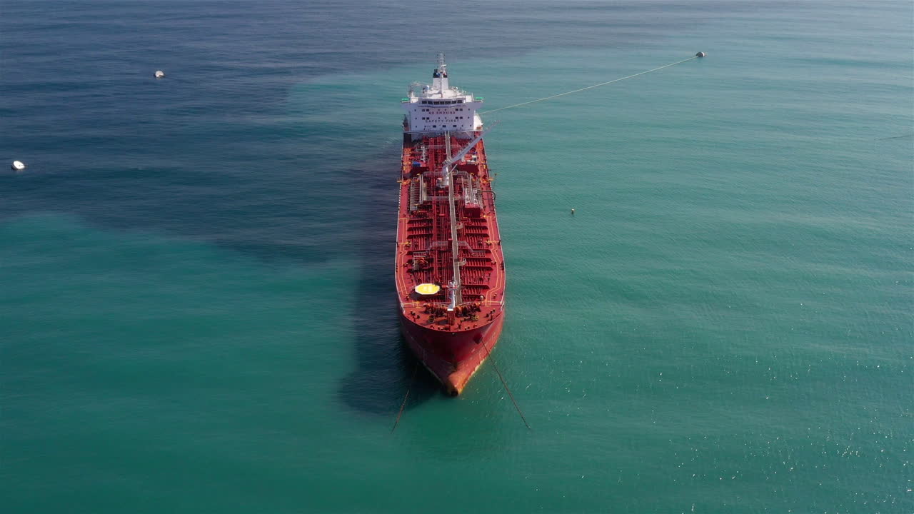 Oil spills out of a ship to Sea- Aerial View