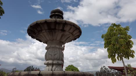 inca emperor atahualpa bronze statue revealed behind sculpted fountain