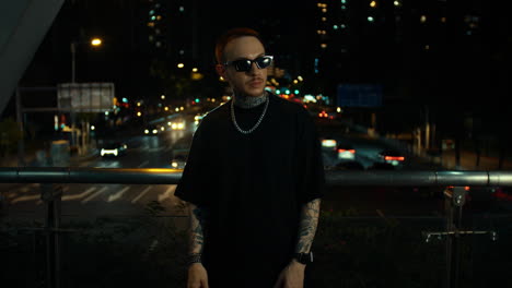 Stylish Man at Night in City