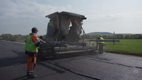 road paving crew in action