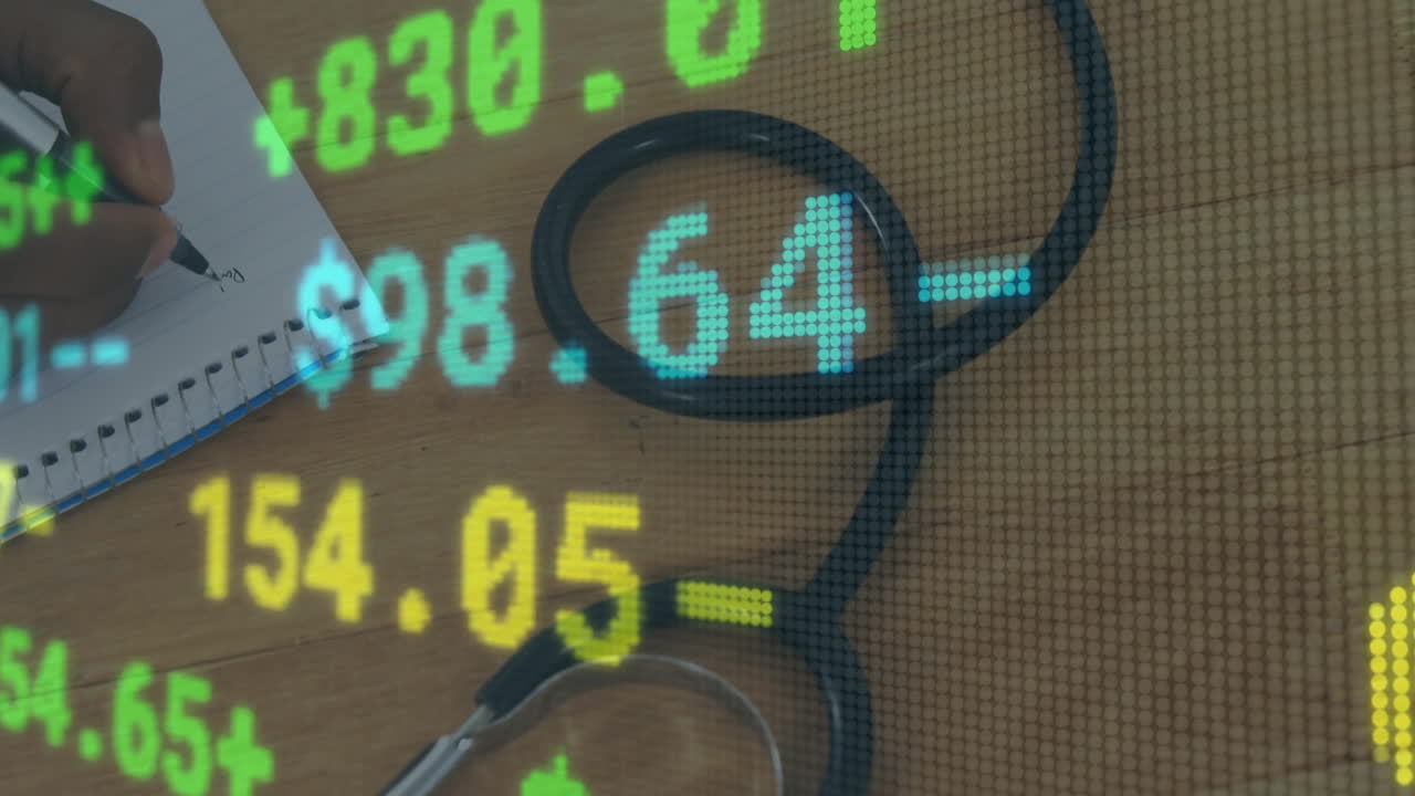 노트북에 글을 쓰는 사람에 대한 금융 데이터 및 주식 시장 애니메이션