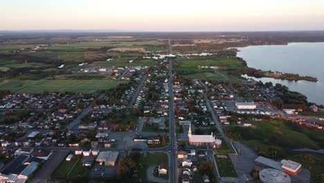 Fly-over-small-town-in-summer