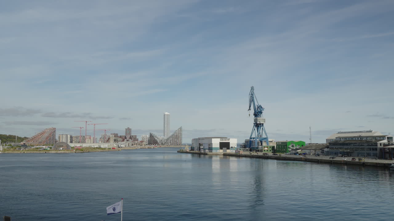 Port City with Crane and Modern Buildings