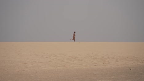running over volcanic dunes and feeling the freedom in fuerteventura, canary island
