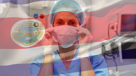 animation of flag of south costa rica waving over surgeon in face masks