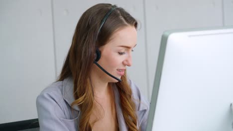 business people wearing headset working in office