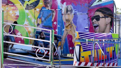 people experiencing a thrilling amusement park ride