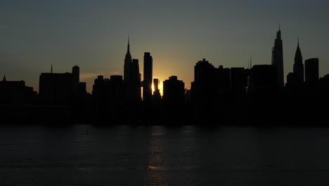 stationary shot with just a glimpse of the rare manhattanhenge phenomenon